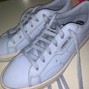 Adidas - Sleek periwinkle sneakers.